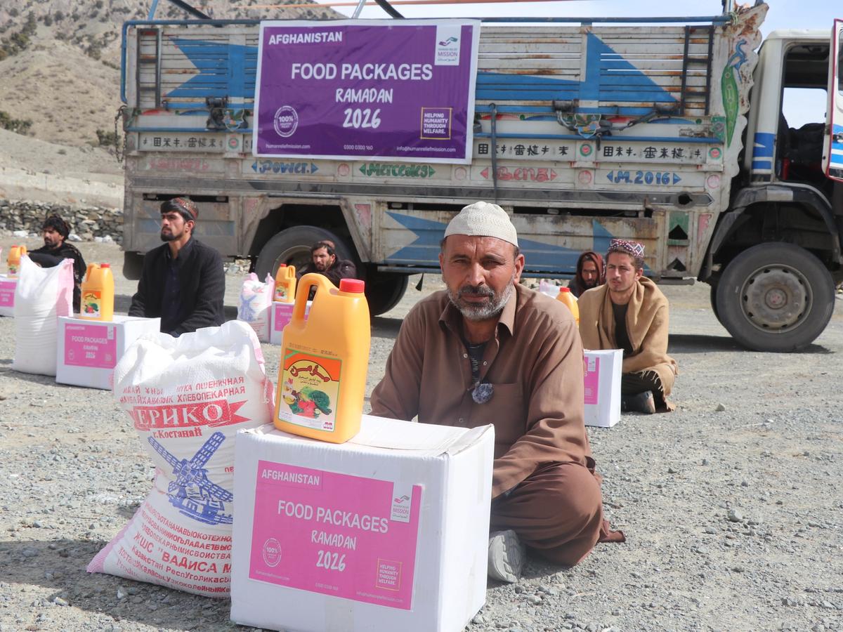 Man with his food package in Afghanistan | Human Relief Mission