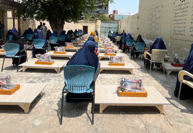 Widows in Afghanistan with Sewing Machine | Human Relief Mission