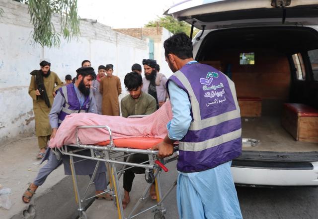 Locals being rescued with the ambulance | Human Relief Mission