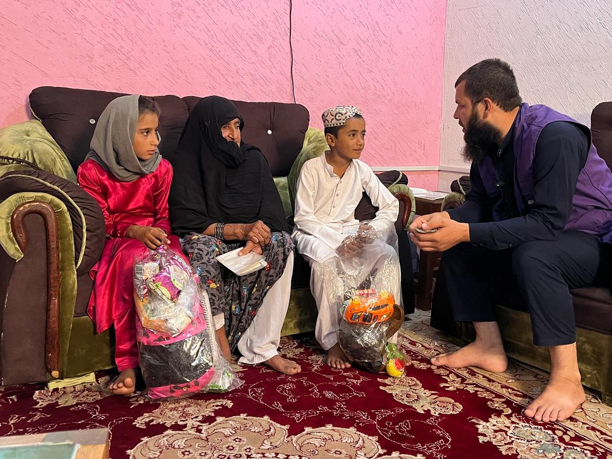 HRM Charity Aid Worker Talking to Orphan and Family in Afghanistan | Human Relief Mission