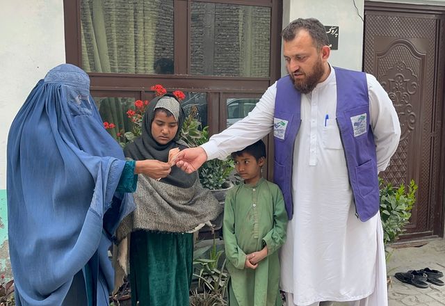 HRM Charity Aid Worker with Family in Afghanistan receiving Cash | Human Relief Mission