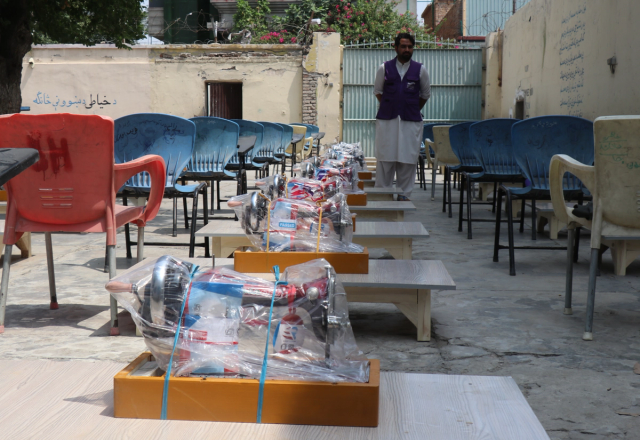 Sewing Machine Being Set Up | Human Relief Mission