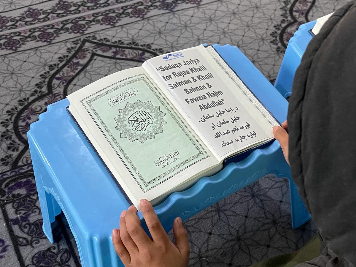 Child Reading Quran in a Masjid | Human Relief Mission