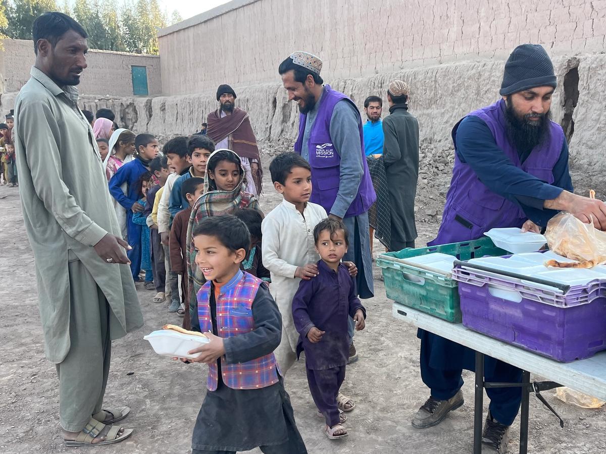 Children in Afghanistan receiving a hot meal | Human Relief Mission