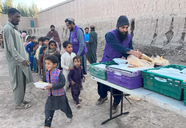Child in Afghanistan Receiving a hot meal | Human Relief Mission