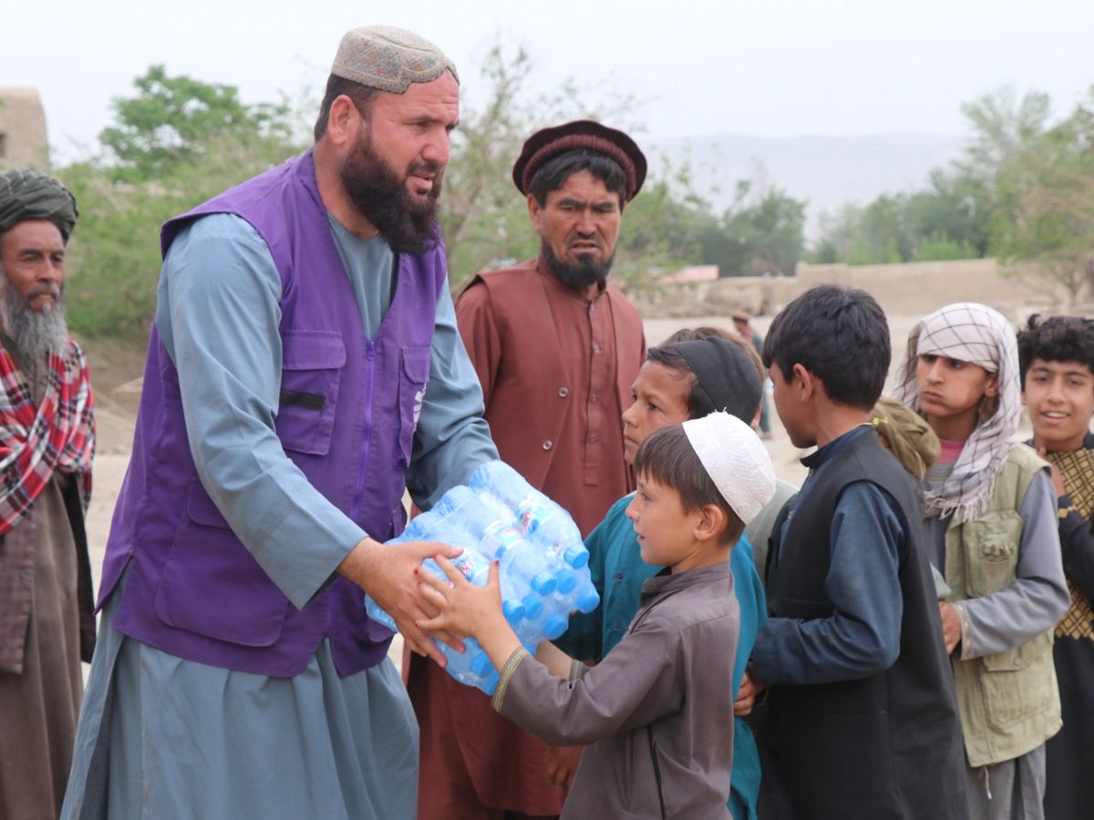 Water Bottles case given to a child in Afghanistan | Human Relief Mission