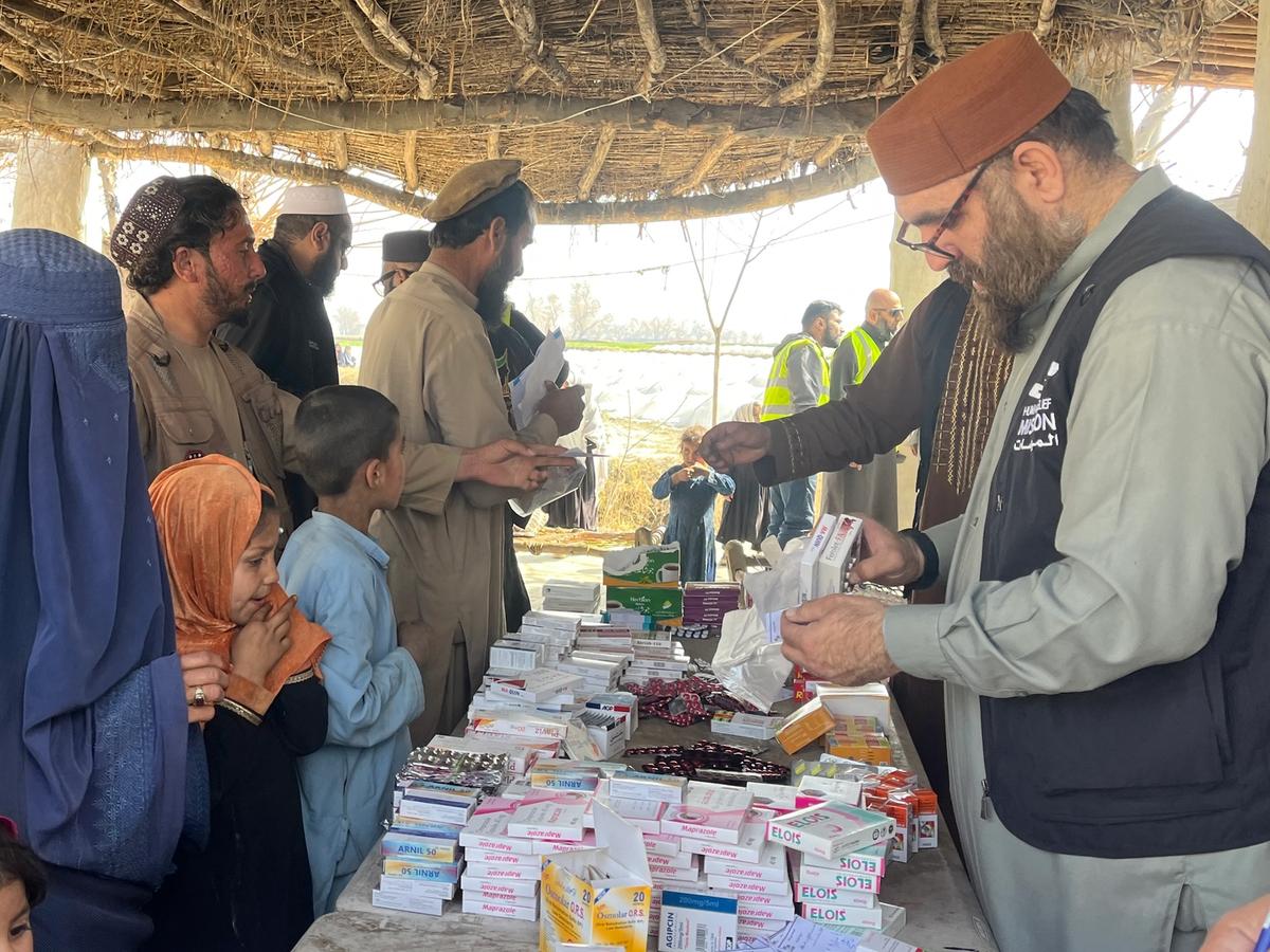 Afghanistan locals receiving medical aid in a medical camp | Human Relief Mission