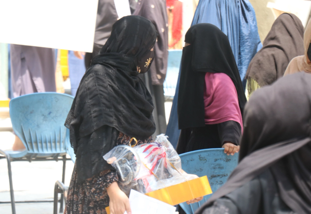 Woman in Afghanistan with Sewing Machine | Human Relief Mission