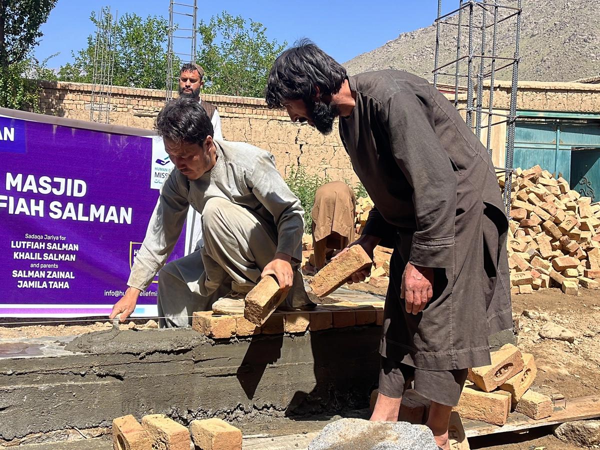 Afghan Locals and HRM Charity Aid worker constructing a masjid | Human Relief Mission