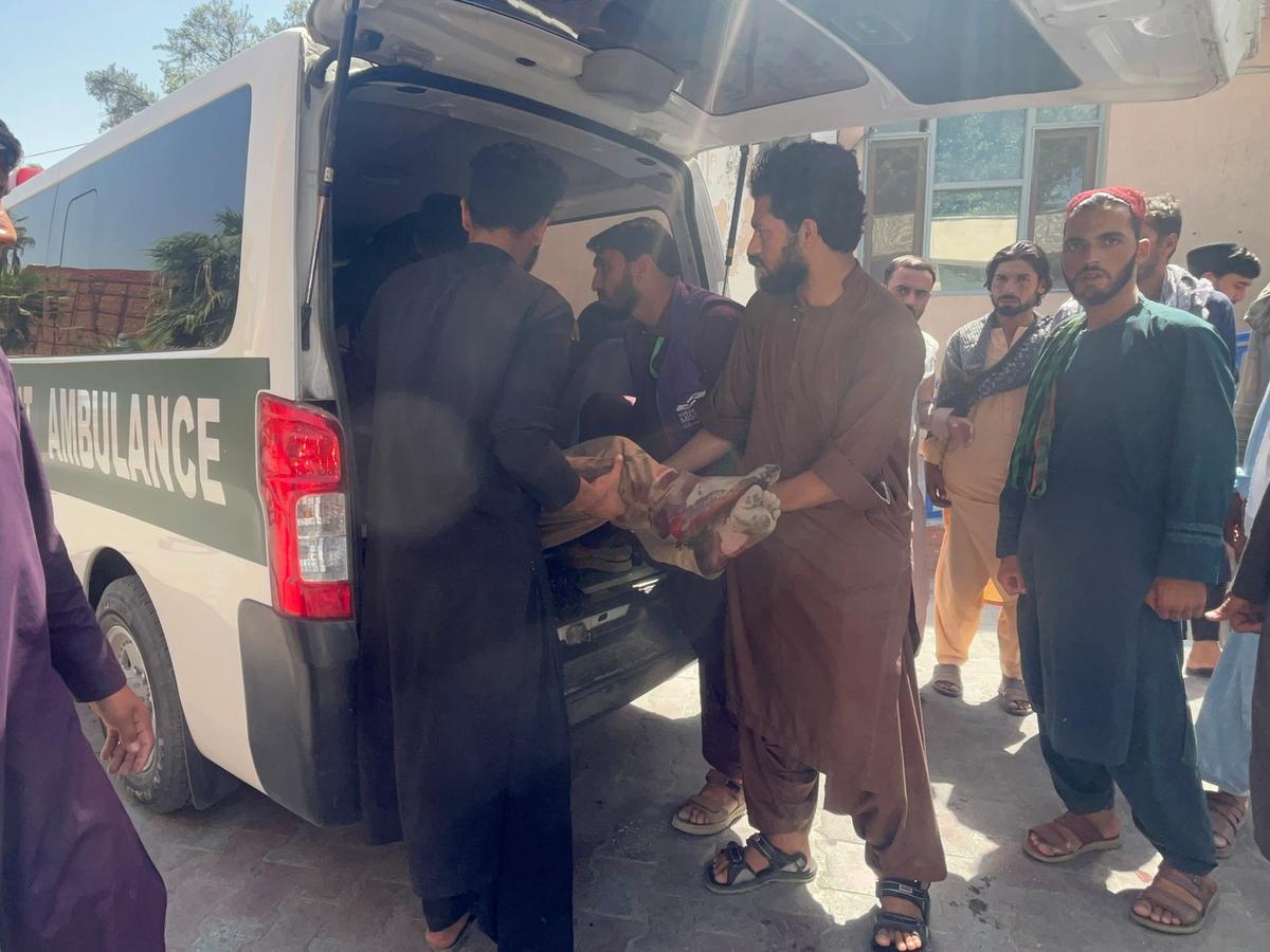 Afghan local being rescued and being put on an HRM ambulance | Human Relief Mission