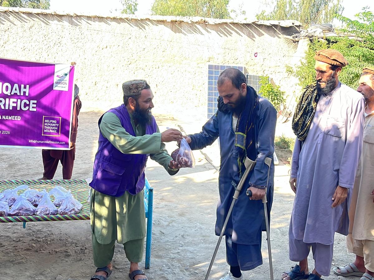 HRM Charity Aid Worker Distributing fresh meat to the locals in Afghanistan | Human Relief Mission