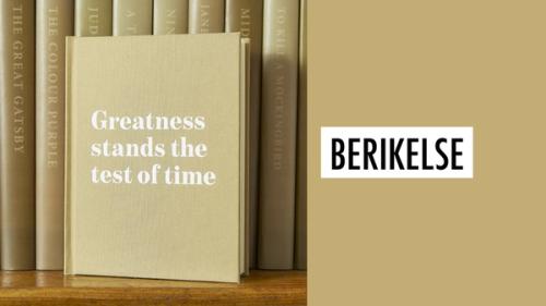 En beige bok med tittelen "Greatness stands the test of time". Ved siden av står det "Berikelse"