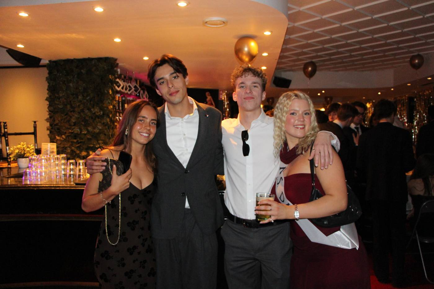 DM students together at the gala bar