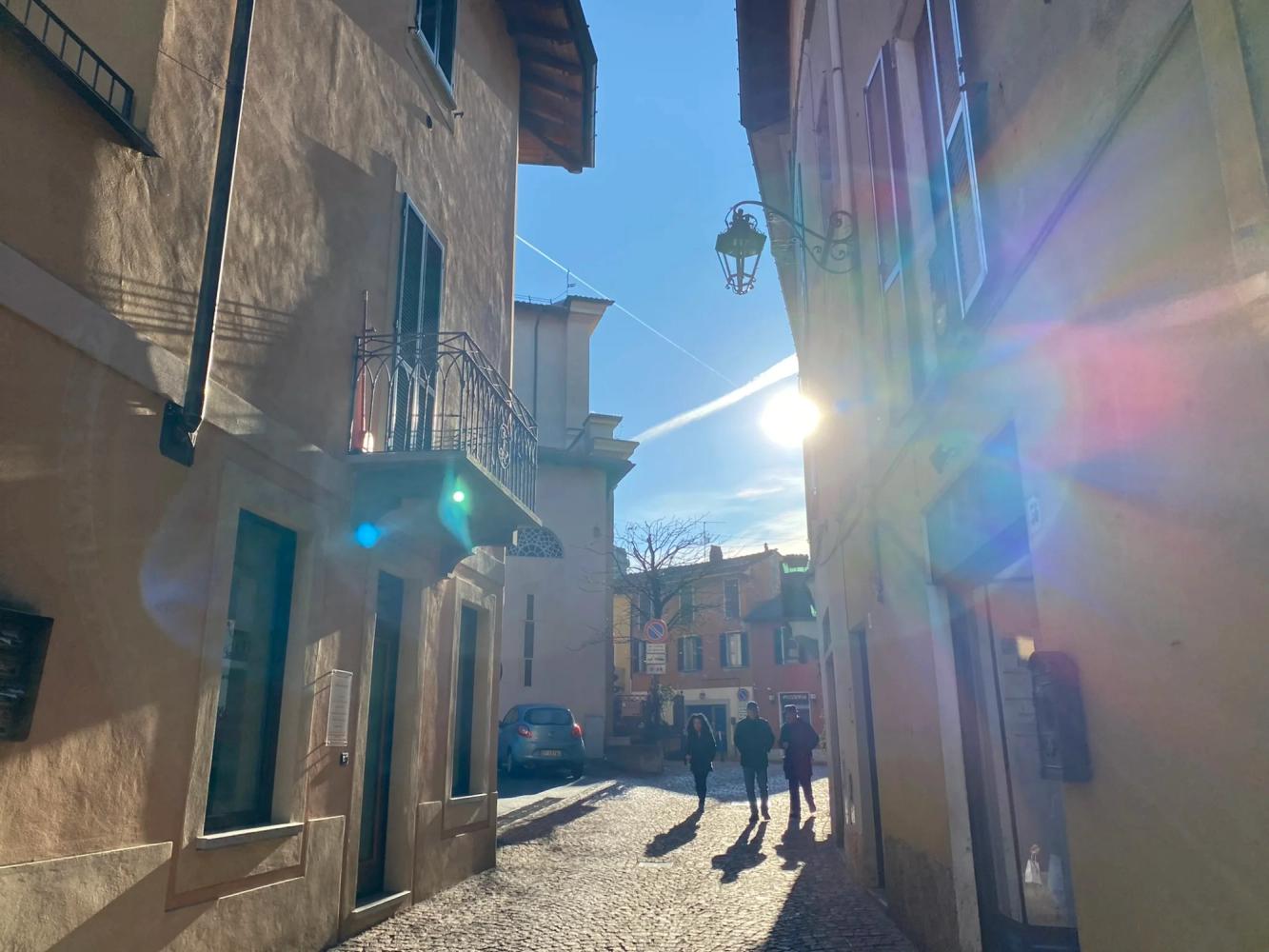Historical center of Luino illuminated by the sun