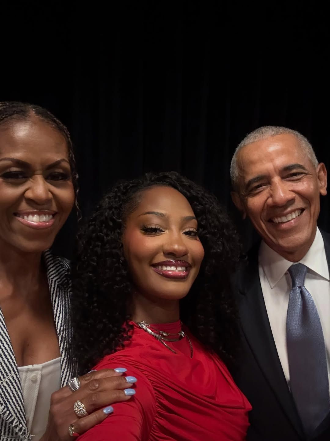 Watch Tems Perform "Me & U" in a Stunning Crimson Gown at the Obama Presidential Center Grand Opening