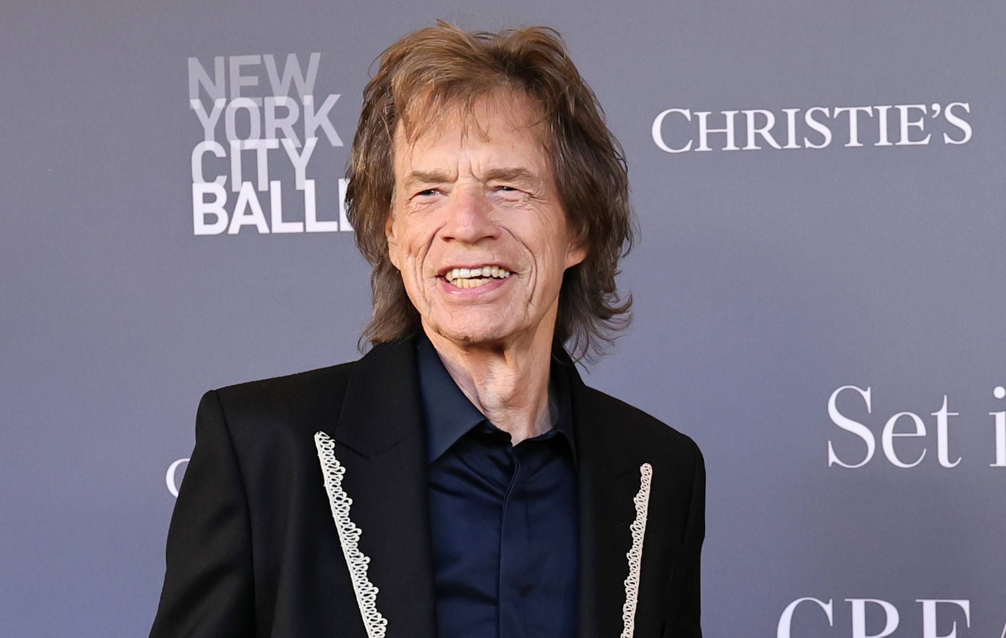 Mick Jagger admits idea of a Rolling Stones biopic "interests" him