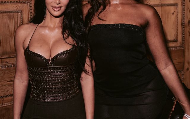 Tems & Kim Kardashian Link Up at SKIMS London Flagship Launch in Sleek Dark Looks