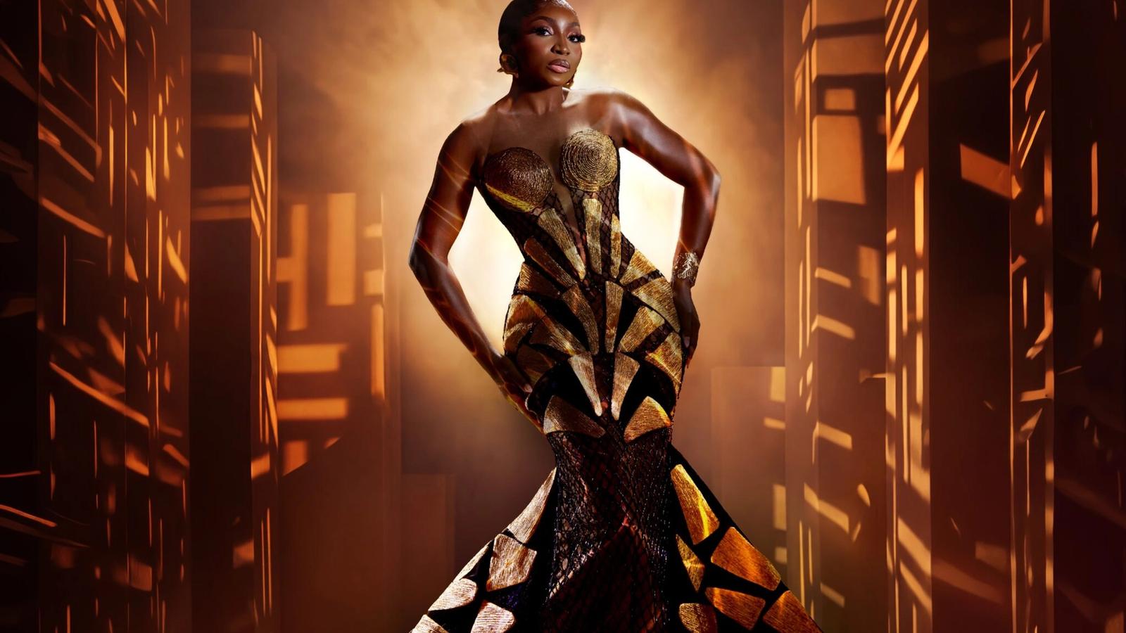 Omowunmi Dada's Sculpted Gold & Black Gown Is Quite the TIFF Red Carpet Look | See Photos — Movies news on dripviewz