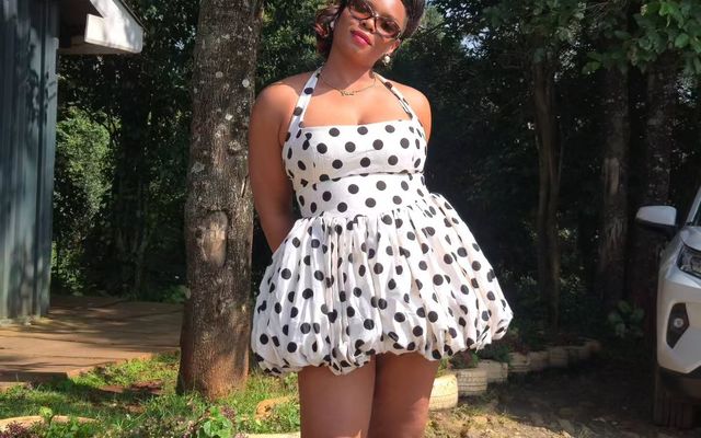 Yemi Alade Shows How to Style a Polka Dot Mini Dress & Trainers for Daytime
