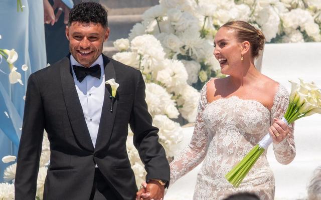 Perrie Edwards glows in lace wedding gown as she marries Alex Oxlade-Chamberlain — News story on dripviewz