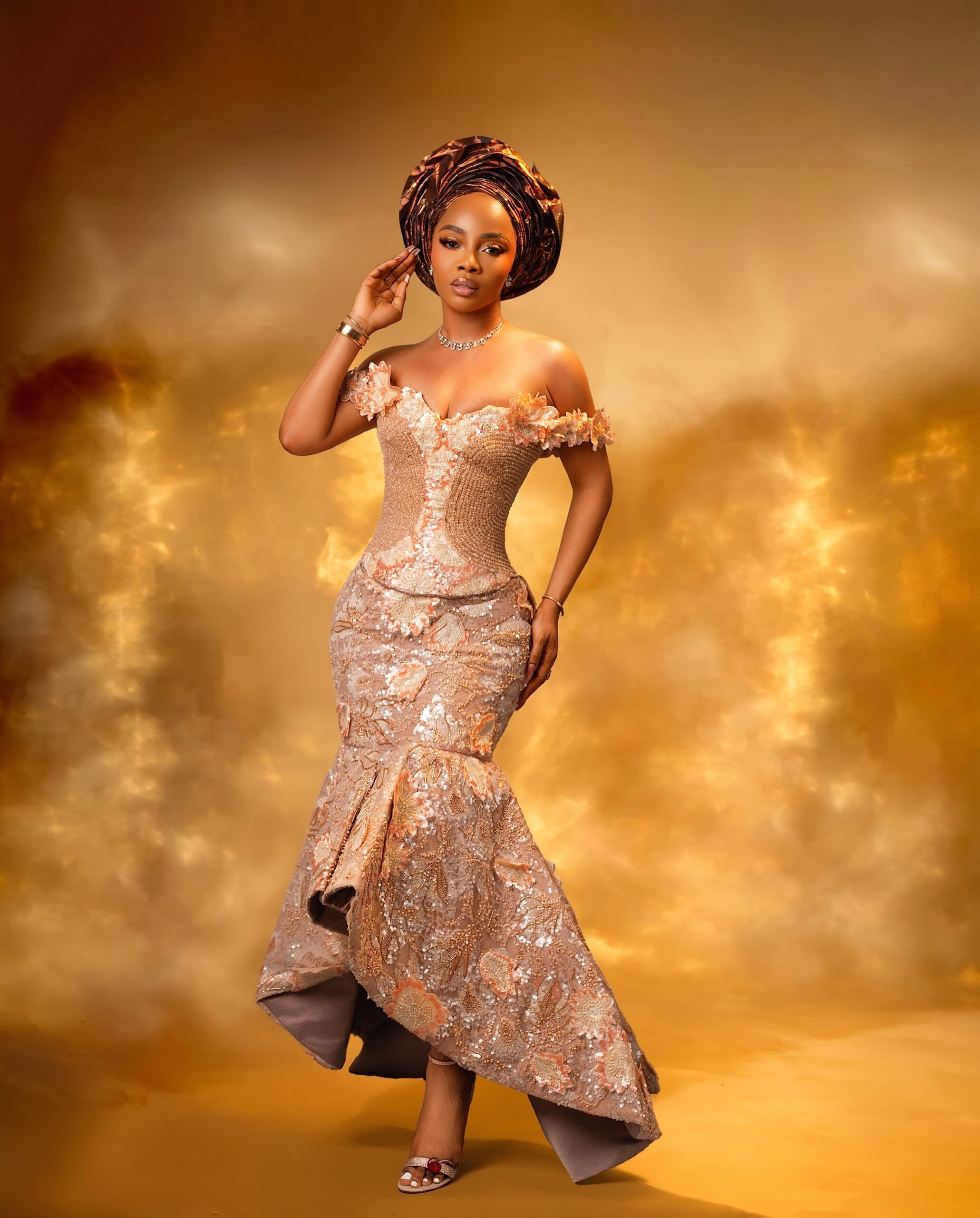 Toke Makinwa's Peach & Bronze Look Is the Wedding Guest Inspiration You Need
