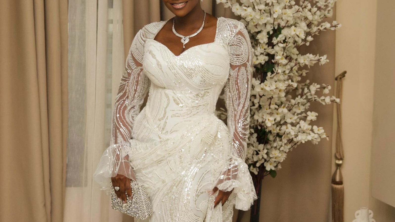 Simi & Adekunle Gold Celebrate Their Son Adeifemi's Dedication in Elegant All-White Style | See Photos — Music news on dripviewz