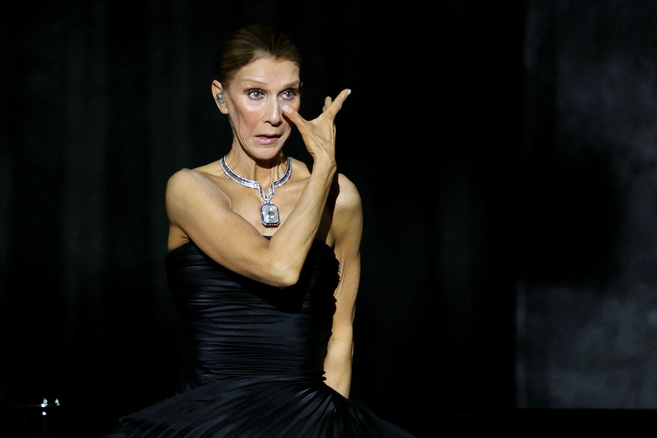Celine Dion declared 'true fighter' as she sobs through triumphant return to stage