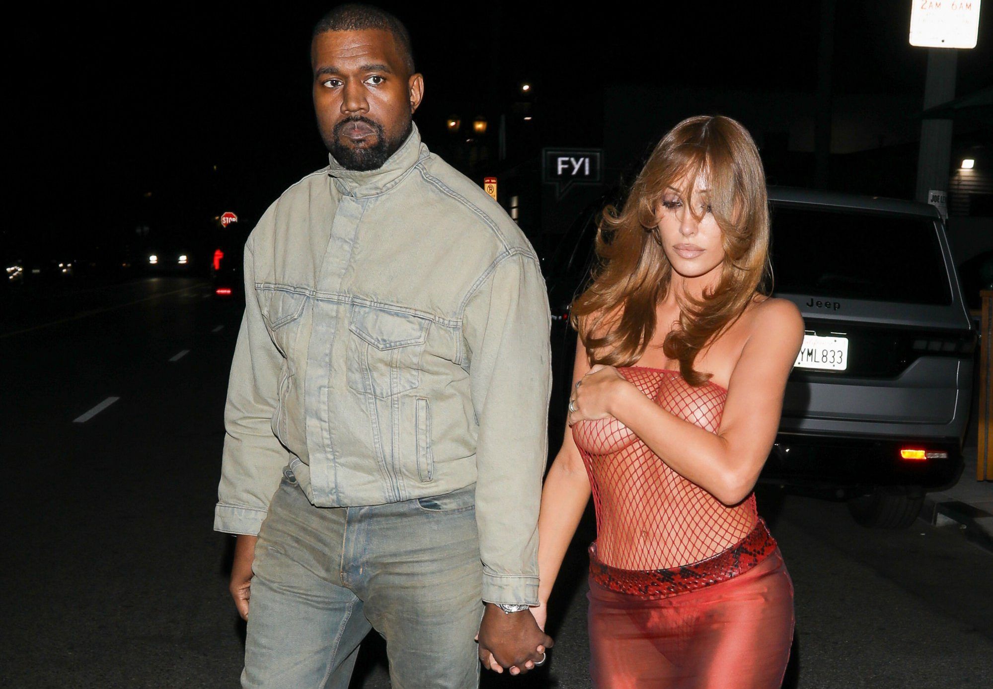 Bianca Censori risks a slip in braless fishnet top on Kanye West date night