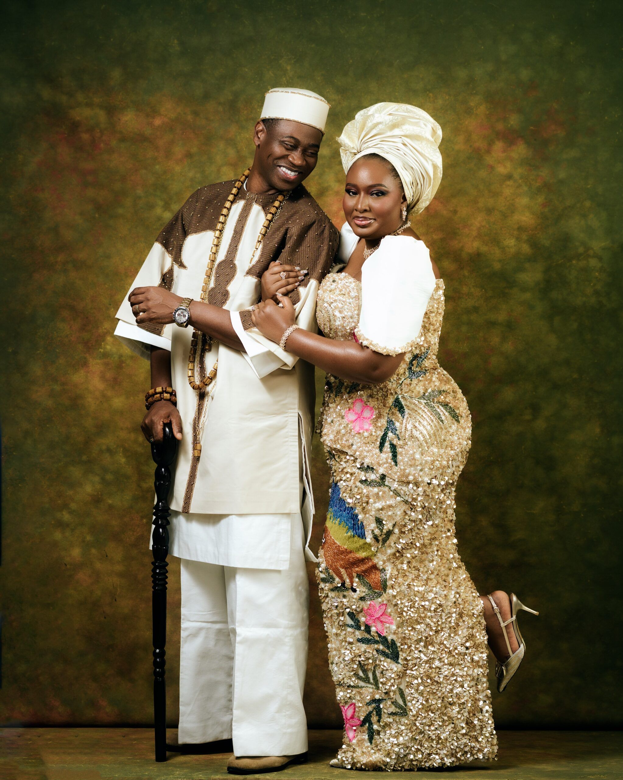 Lateef Adedimeji & Mo Bimpe Stepped Out in Regal Champagne Gold Looks for Their Triplets' Thanksgiving