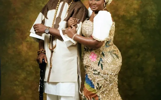 Lateef Adedimeji & Mo Bimpe Stepped Out in Regal Champagne Gold Looks for Their Triplets' Thanksgiving