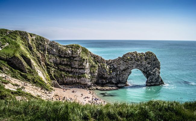 Durdle door, the famous cliffside with a hole that the sea travels through