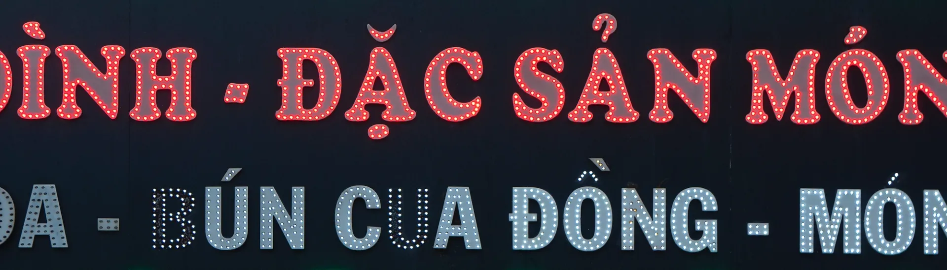 Neon dot Cooper Black sign for a local restaurant in Saigon (Photo taken in 2020 by Hiếu, a member of Lưu Chữ).