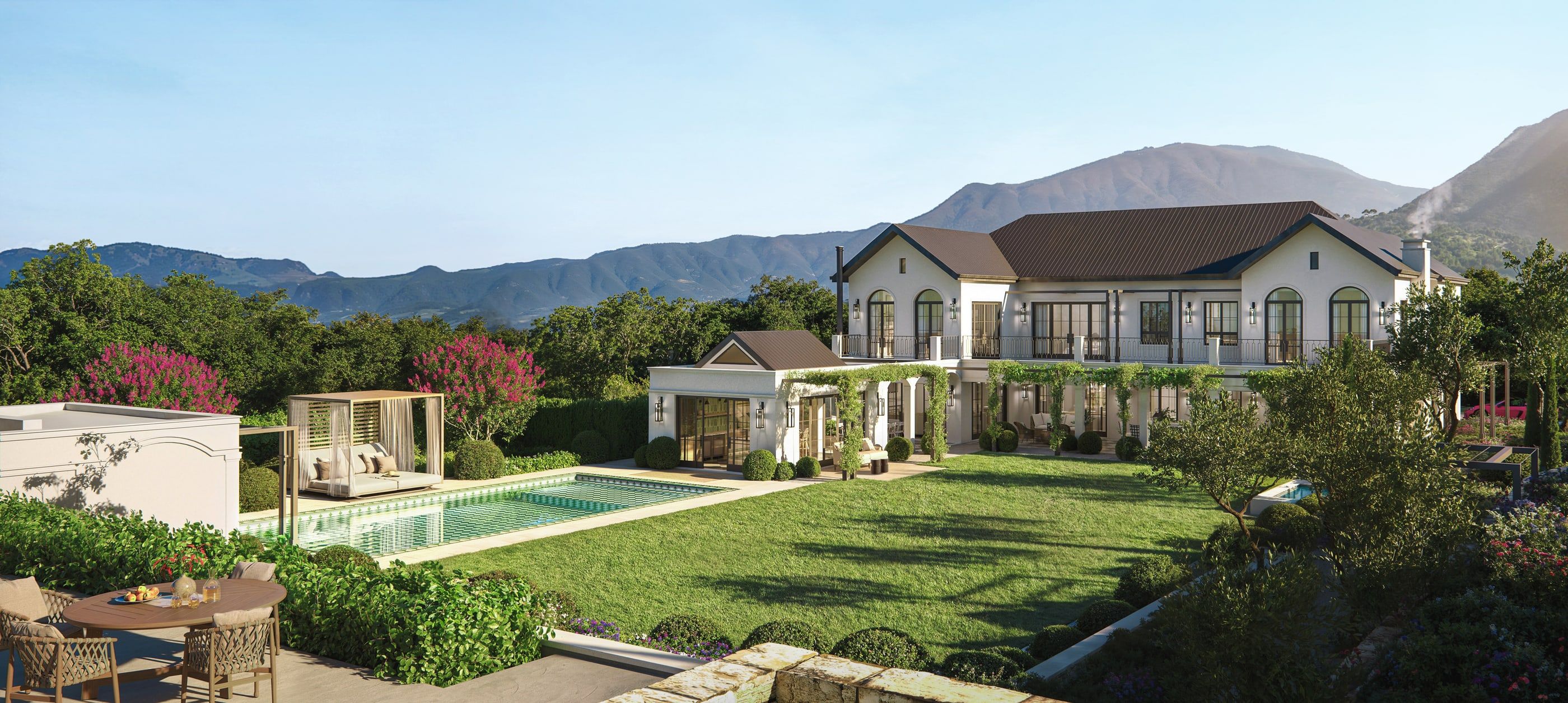 Sunkiss: the house, its pool and lawn, with the Constantia mountains behind