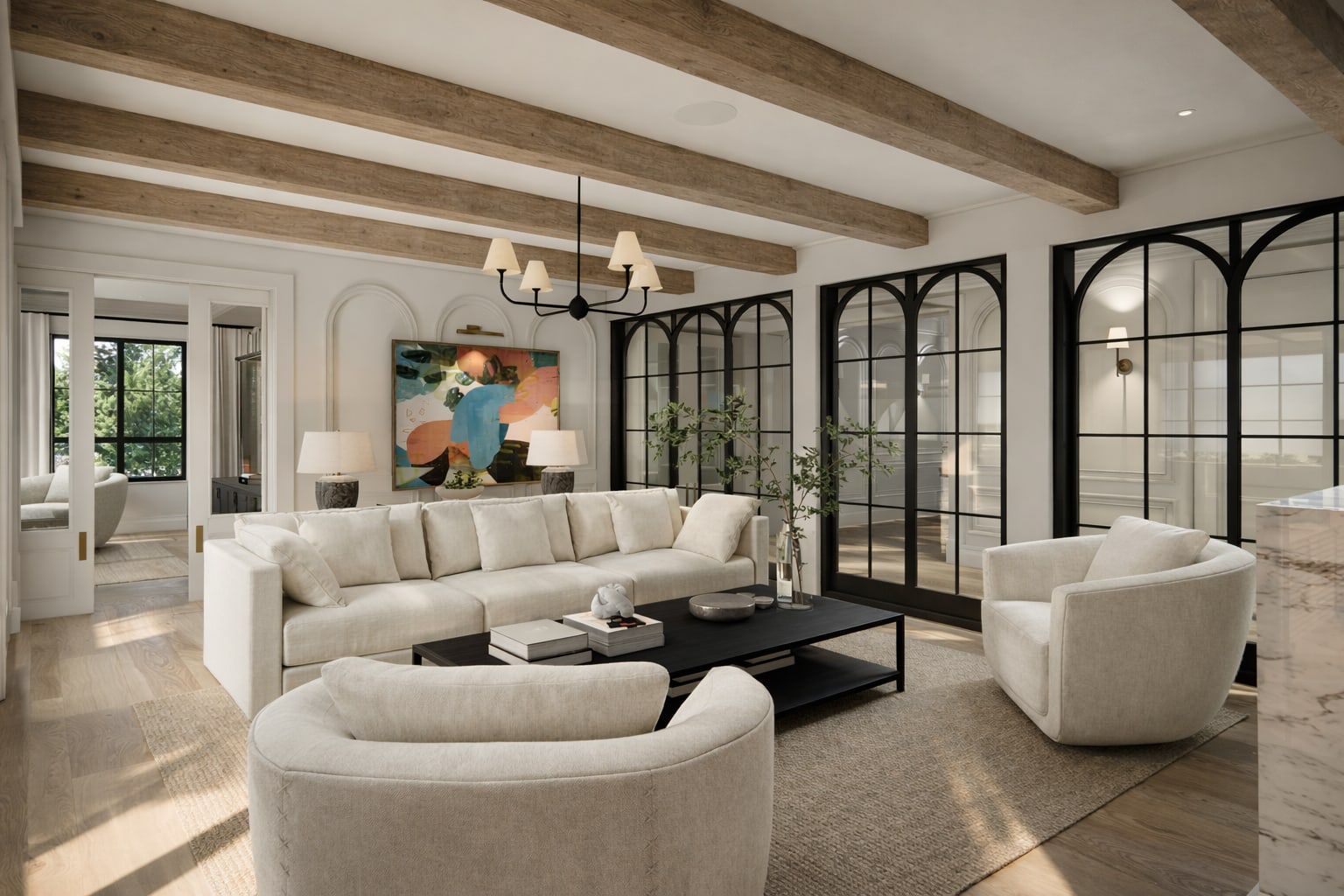 The living room at Moondance, with black-framed arched glazing