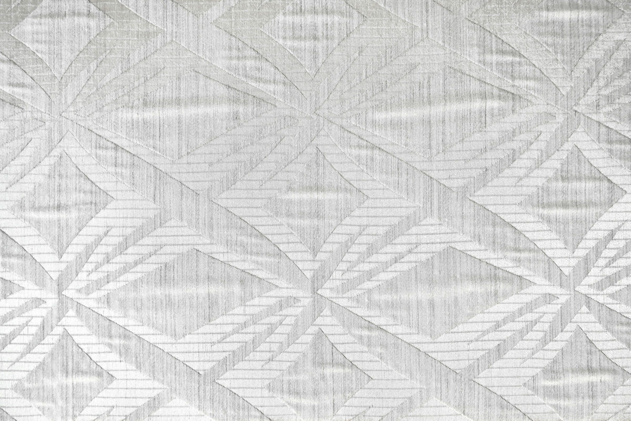 White jacquard fabric with a geometric diamond pattern