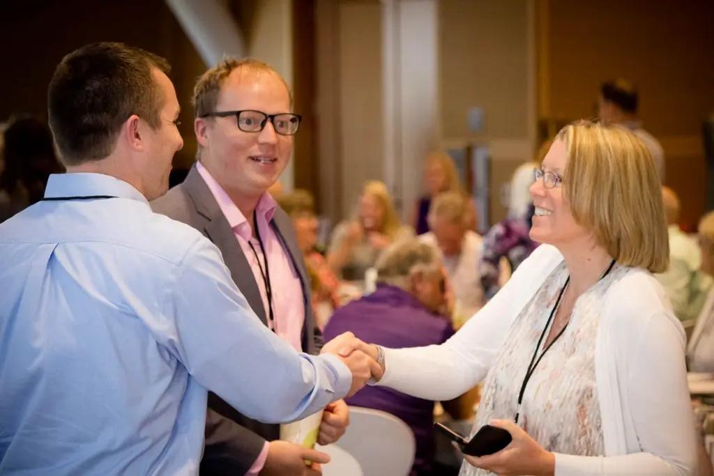 Treasure Valley CFO members shaking hands