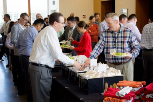 Two TVCFO members meeting over food