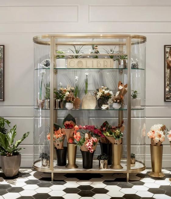 Floral arrangements displayed within the lobby of Woodlark Hotel.