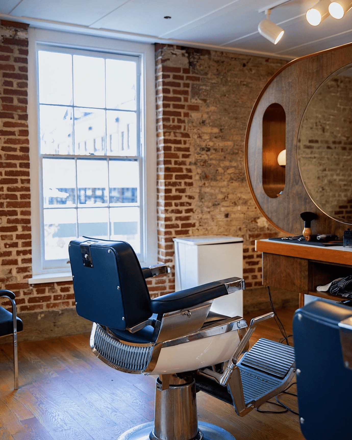 An empty barber chair in a Fellow barbershop. 