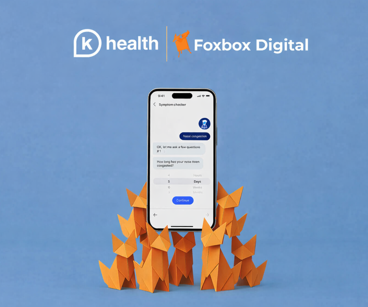 Paper origami foxes holding up a smart phone depicting the K Health Mobile App