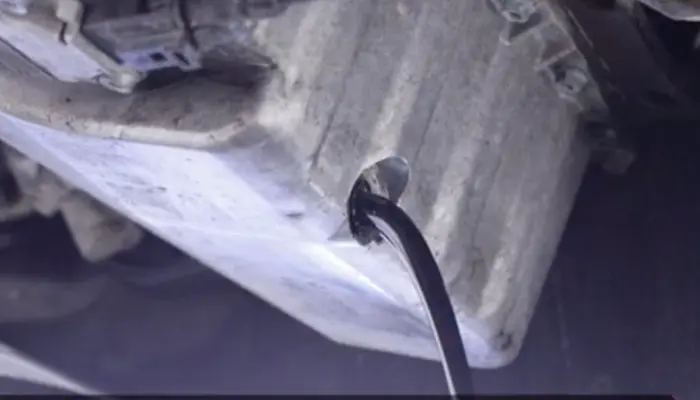 Ha en oljeoppsamler klar