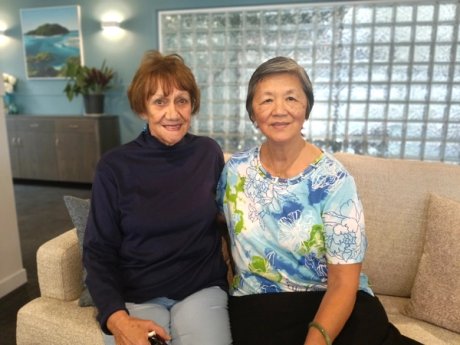 Two older ladies smiling