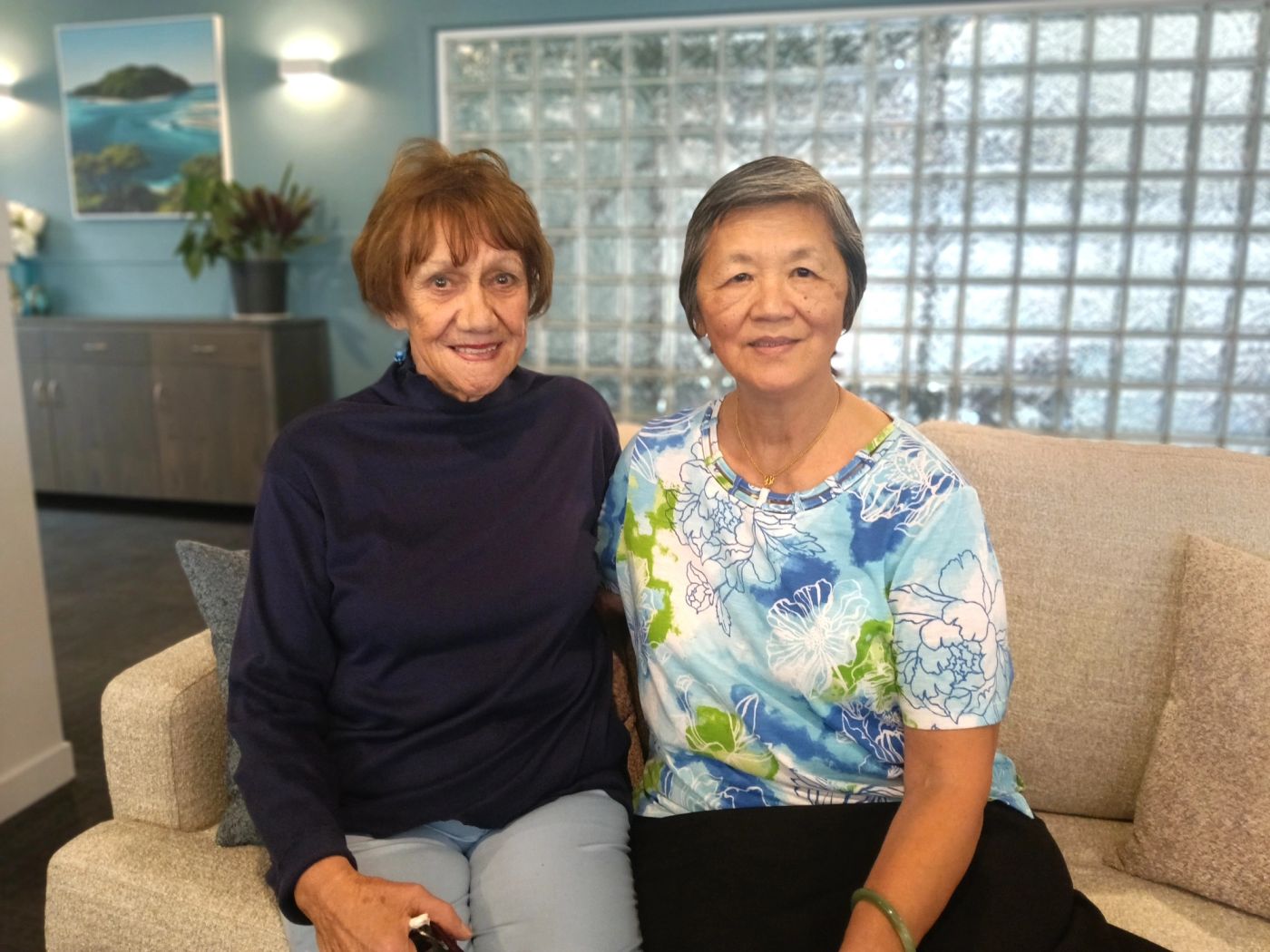 Two older ladies smiling
