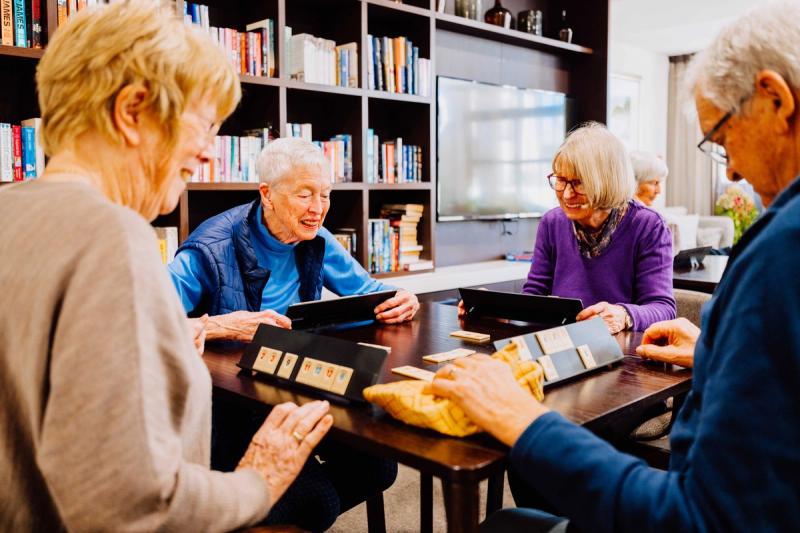 Residents enjoying a game in the Library