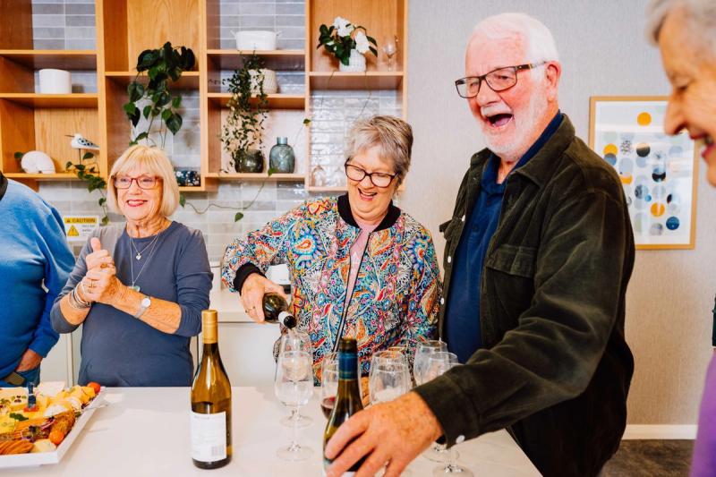Residents enjoying happy hour
