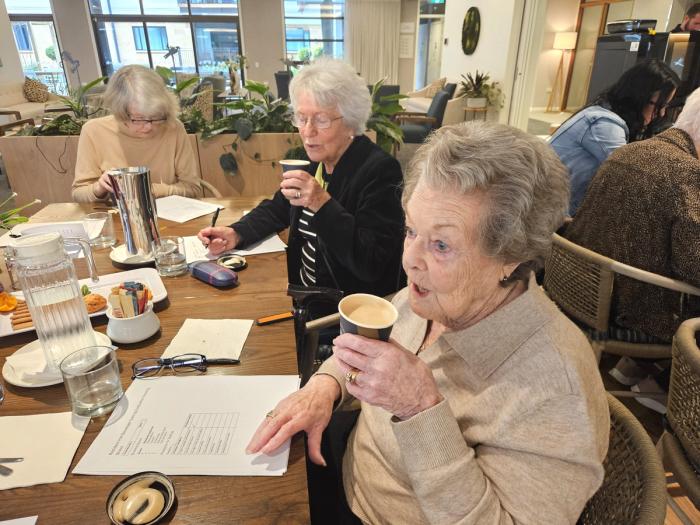 Ladies sipping on coffee