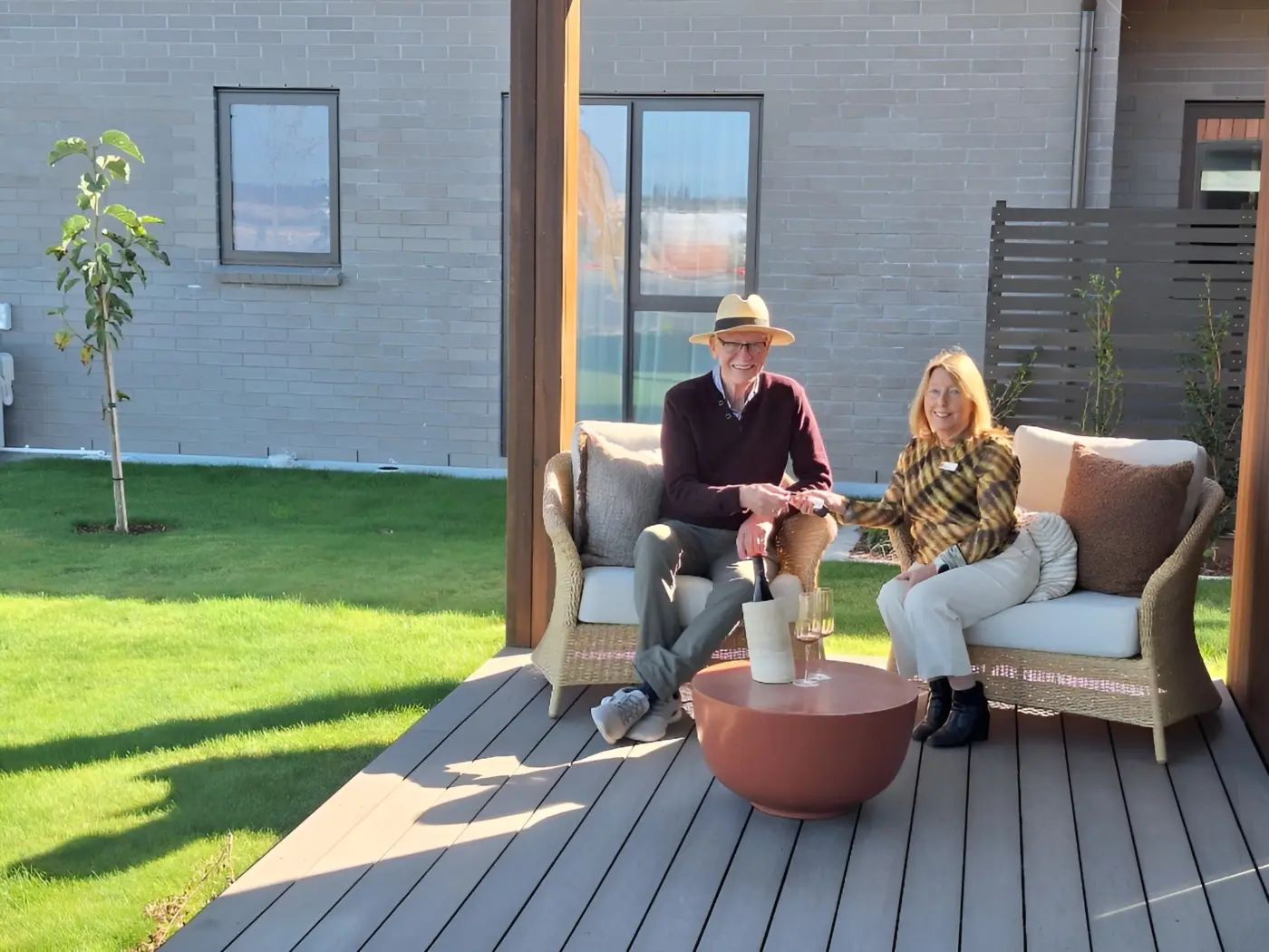 Village Manager Leigh celebrating with Lincoln Plains' first resident, Anton Ijsseldijk.