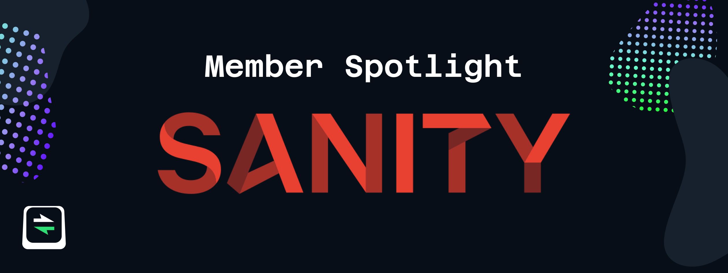 Graphic with the text ‘Member Spotlight’ at the top and ‘Sanity’ prominently displayed in bold, angular red font in the center, set against a dark background with colorful dotted patterns and abstract shapes on the sides. A small Open Source Pledge keycap logo is in the bottom left corner.