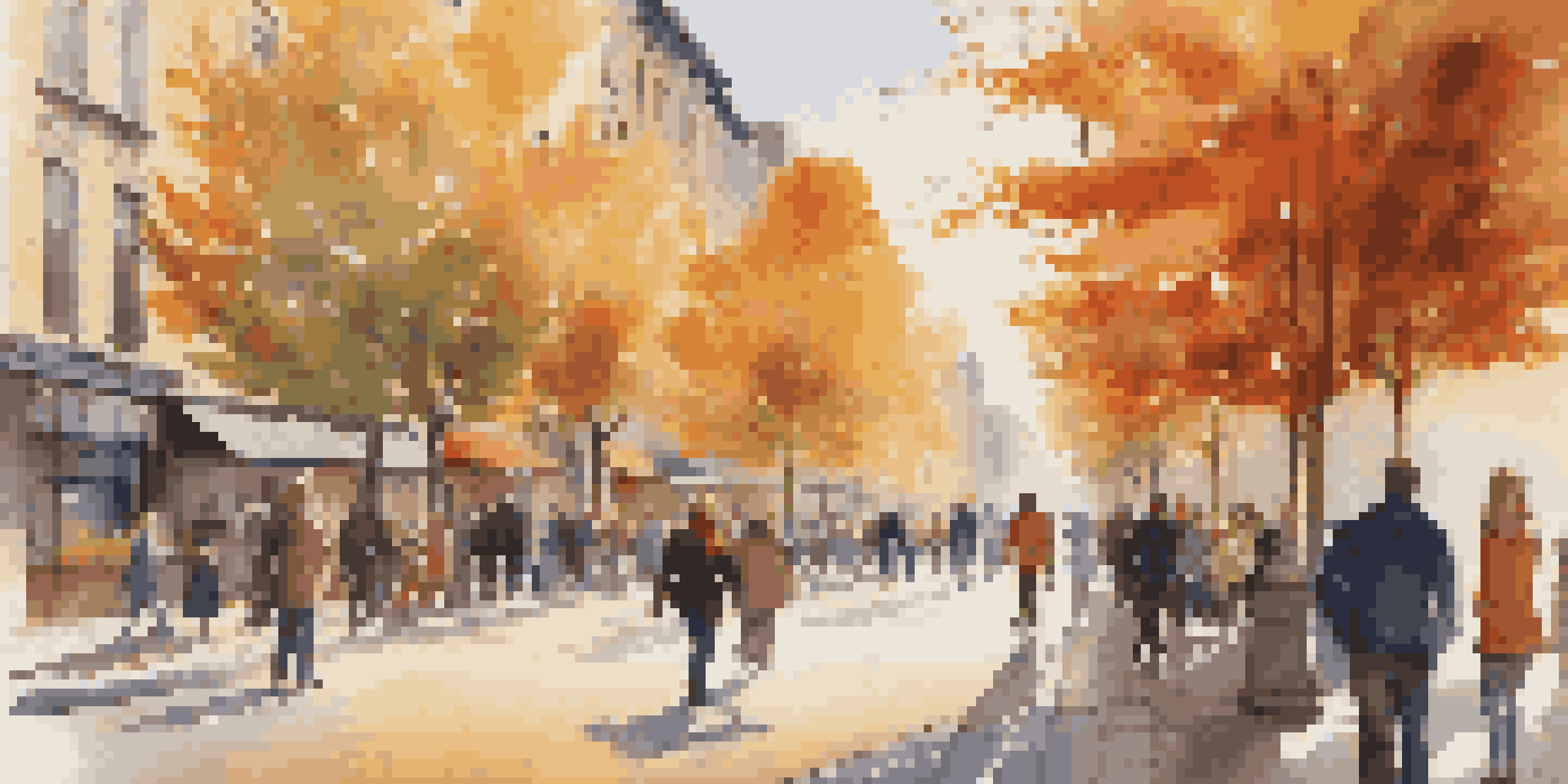 A busy city street in autumn with colorful trees and people walking.