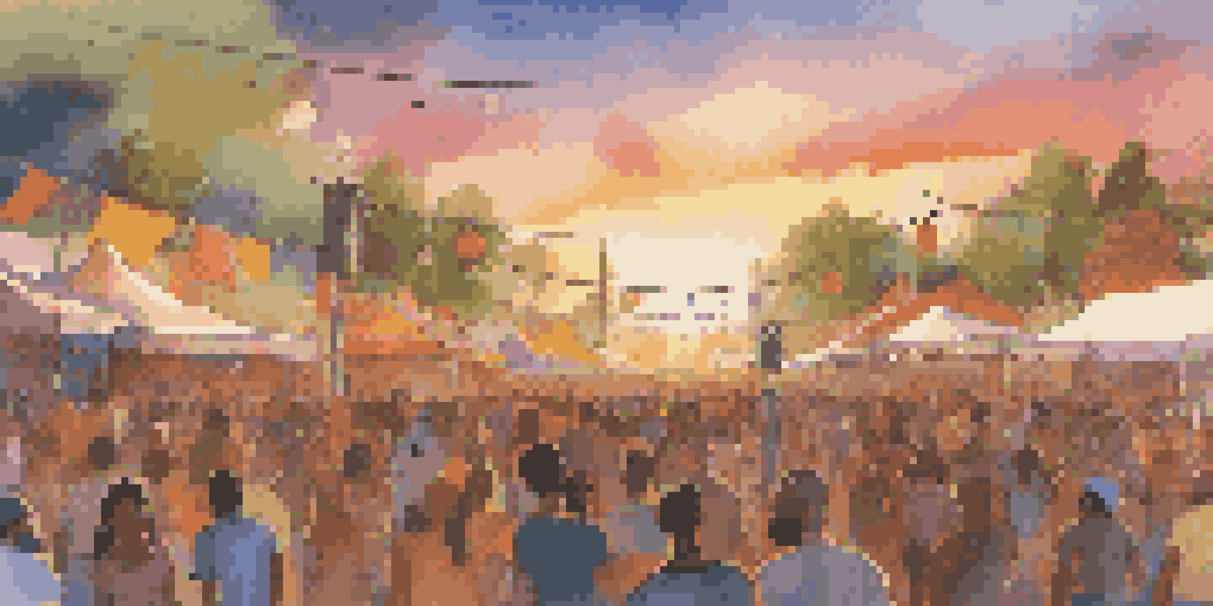 A lively outdoor music festival with diverse people enjoying live music under a sunset.